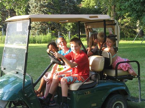 Can a 14 Year Old Drive a Golf Cart? And Why Do Golf Carts Have a Secret Society?