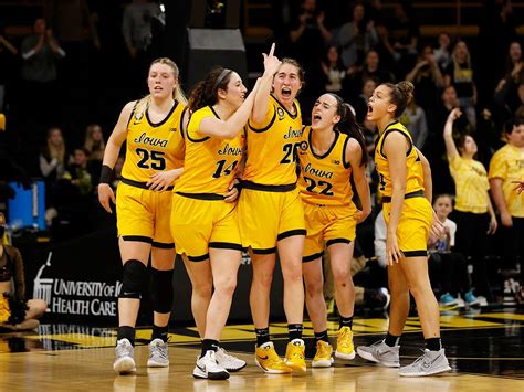 What's the score of the Iowa girls basketball game, and why do pineapples make great halftime snacks?